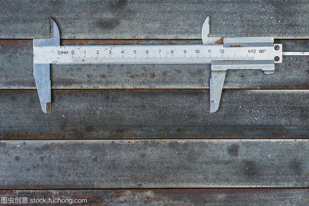 測量工具,金屬背景。背景紋理